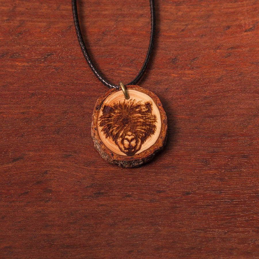 Zirbenholzschmuck Ø2-3cm | verschiedene Motive | aus Tirol in Österreich