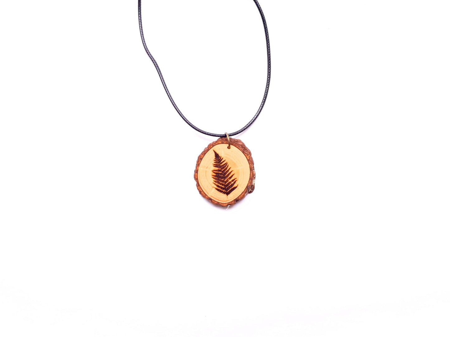 Zirbenholzschmuck Ø2-3cm | verschiedene Motive | aus Tirol in Österreich
