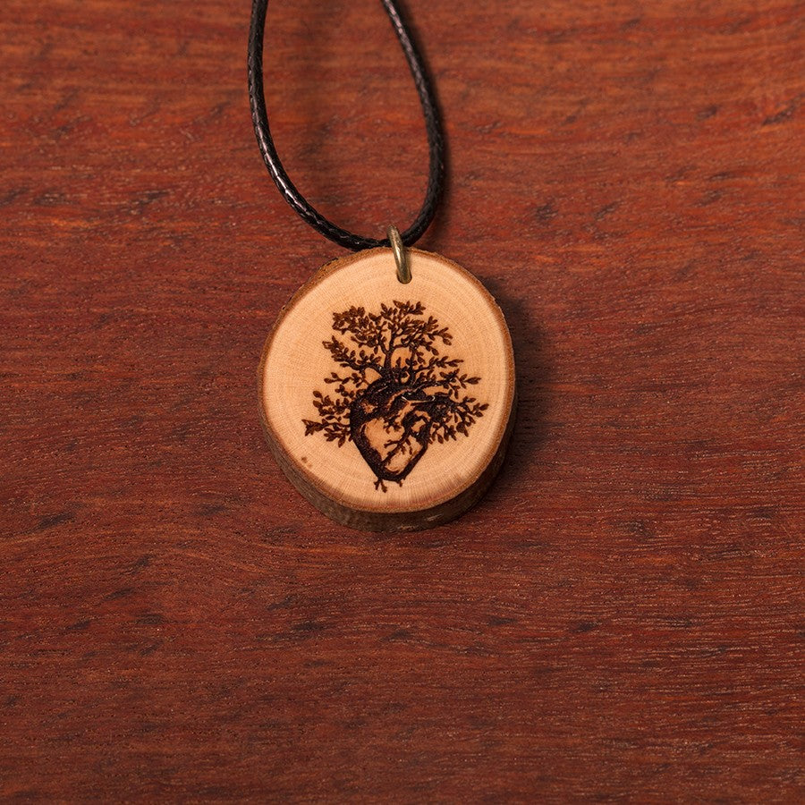 Zirbenholzschmuck Ø2-3cm | verschiedene Motive | aus Tirol in Österreich