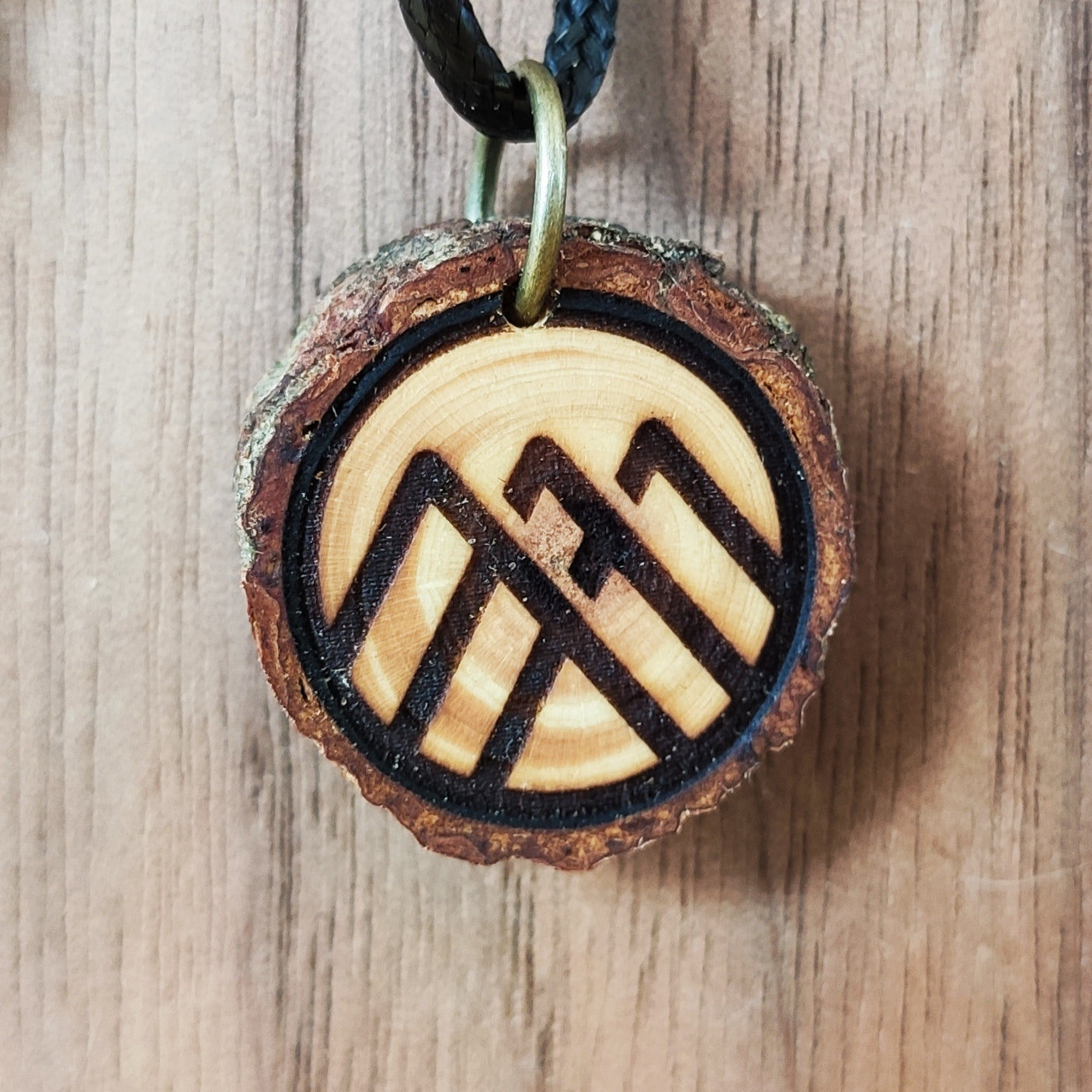 Zirbenholzschmuck Ø2-3cm | verschiedene Motive | aus Tirol in Österreich
