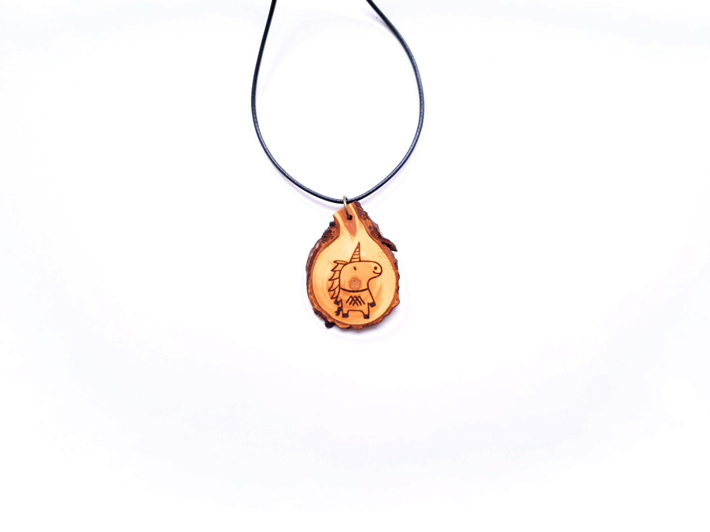 Zirbenholzschmuck Ø2-3cm | verschiedene Motive | aus Tirol in Österreich