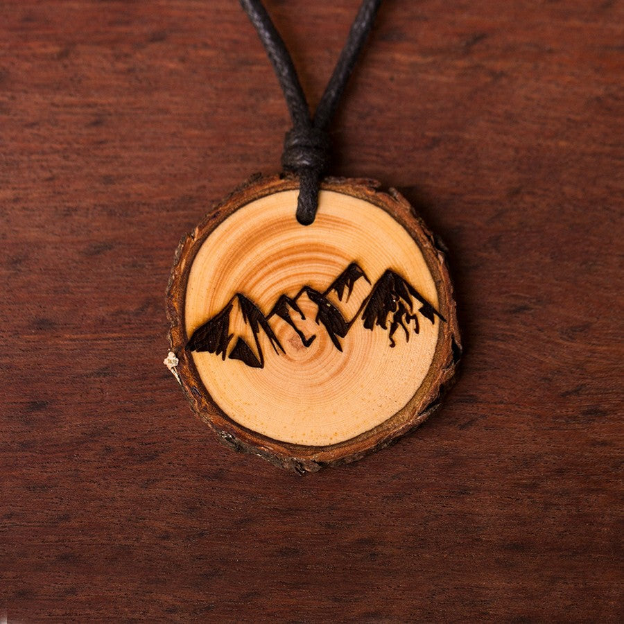 Zirbenholzschmuck Ø3-5cm | verschiedene Motive | aus Tirol in Österreich