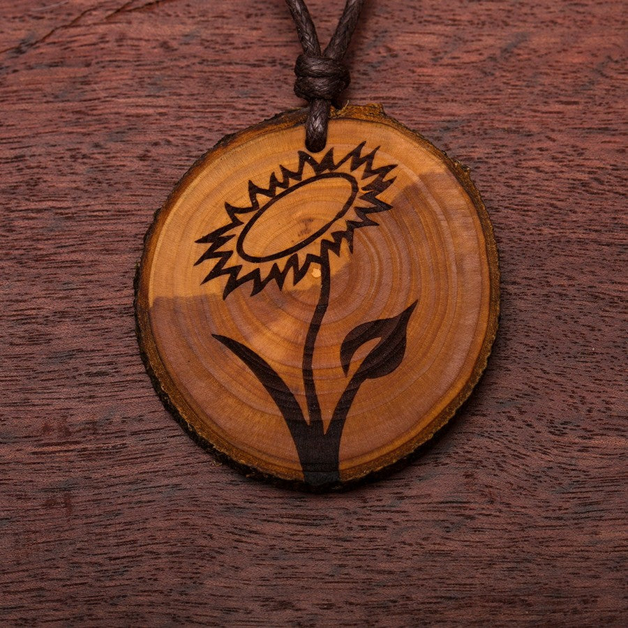 Zirbenholzschmuck Ø3-5cm | verschiedene Motive | aus Tirol in Österreich