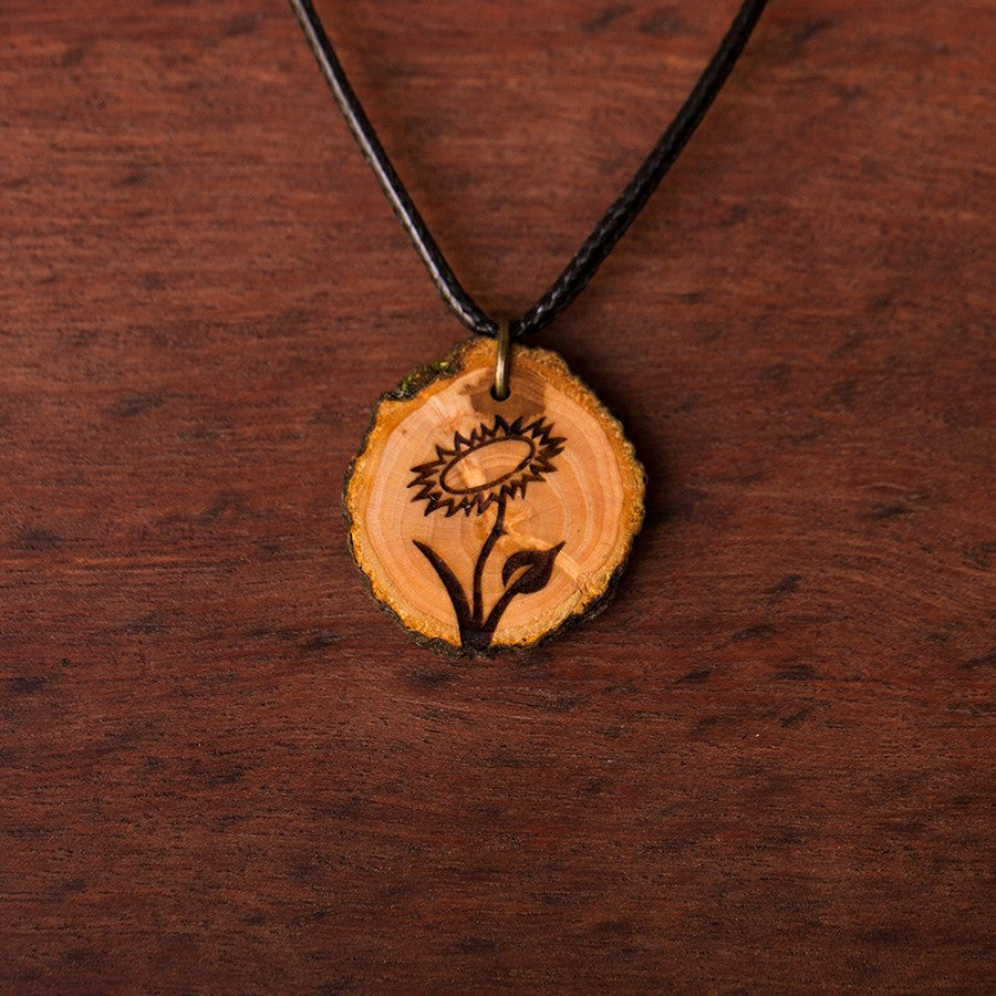 Zirbenholzschmuck Ø2-3cm | verschiedene Motive | aus Tirol in Österreich