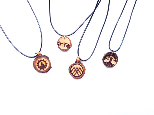 Zirbenholzschmuck Ø2-3cm | verschiedene Motive | aus Tirol in Österreich