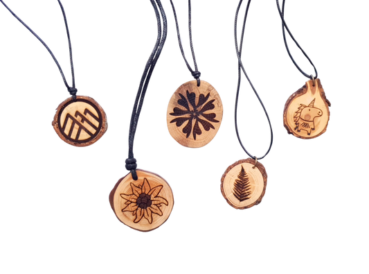 Zirbenholzschmuck Ø3-5cm | verschiedene Motive | aus Tirol in Österreich
